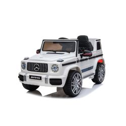 Mașină electrică copii 12V New Mercedes G, alb, licență originală, baterii, uși care se deschid,  2x motoare, baterie 12 V, telecomandă 2.4 Ghz, suspensie spate, pornire lină